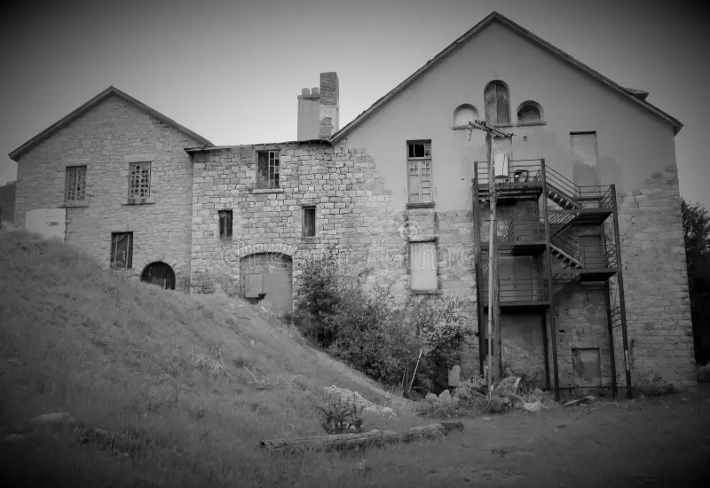 Later north exterior view of the Granite Paper Mill with exterior stairways